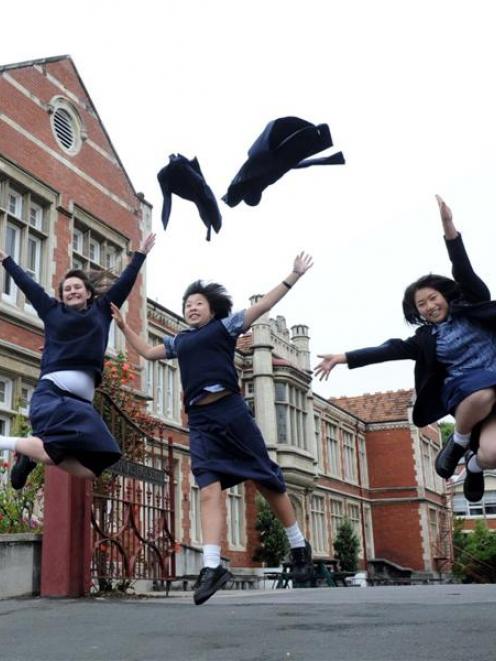 Otago Girls High School pupils (from left) Sarah Walker (16), Melinda Yee (15) and Aki Nagao (16...