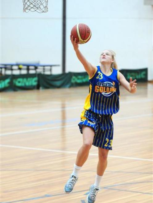 Otago Goldrush forward Casey Lockwood makes a lay-up at the Edgar Centre yesterday. Photo by...