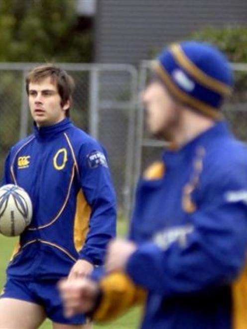 Otago halfback Sean Romans (left) trains with his Otago team-mate Chris Small at Logan Park...