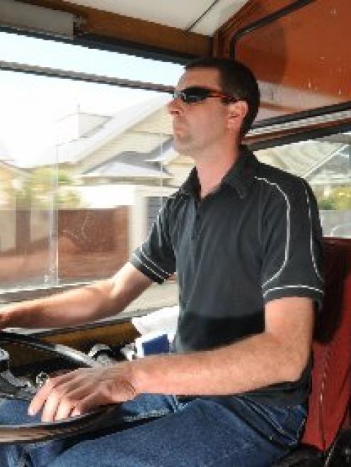 Otago Heritage Bus Society Incorporated executive member Alastair Stewart takes  Leyland Leopard...
