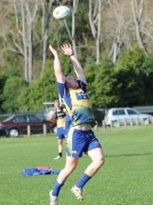 Otago loose forward Gareth Evans prepares to catch a ball at training at Logan Park this week....