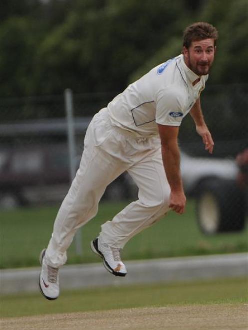 Otago medium pacer Warren McSkimming bowls against Auckland during their Plunket Shield clash at...