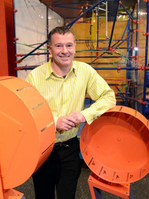 Otago Museum director, science engagement, Dr Craig Grant with, in foreground, two zoetropes, pre...