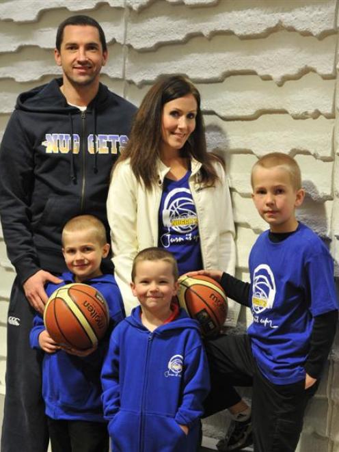 Otago Nuggets captain Mark Dickel with his family, wife Ashley and sons (from left) Madden (6),...