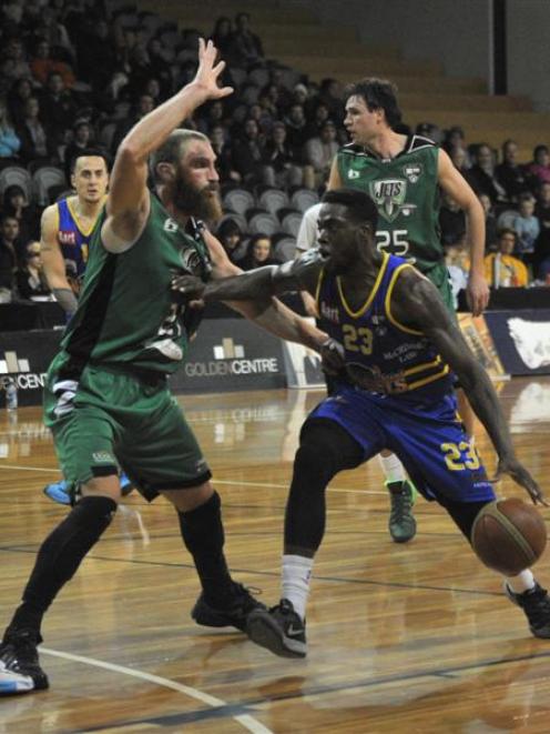 Otago Nuggets import Brandon Bowdry attempts to find a way past the Manawatu Jets' Nick Horvath...