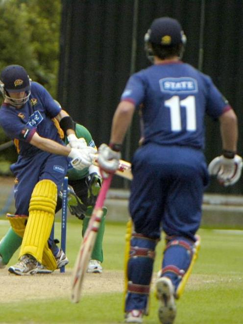 Otago opener Aaron Redmond sweeps for four on his way to 100 not out in the twenty/20 match...