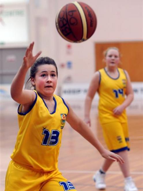 Otago player Claudia Flaws lines up the ball during an under-13 representative match against...