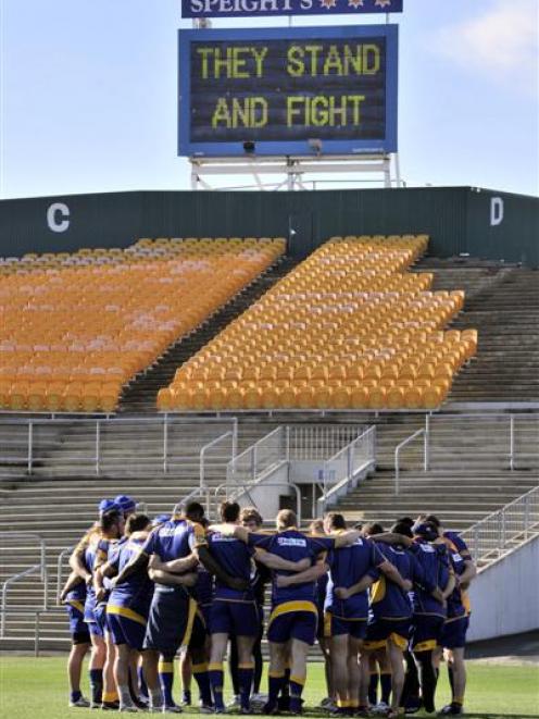 Otago players huddle at Carisbrook yesterday morning before heading to Invercargill for today's...