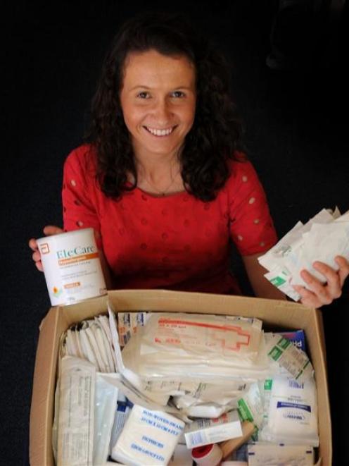 Otago Polytechnic nursing student Jessica Hardegger  sits among medical supplies she and another...