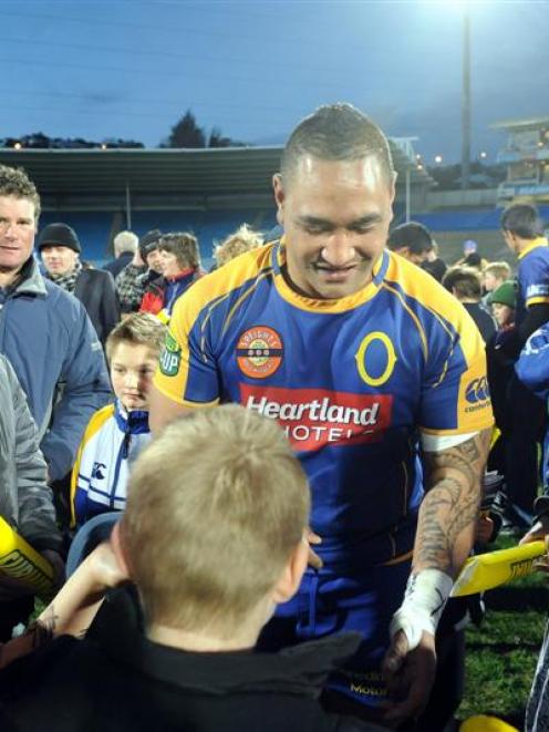 Otago prop Halani Aulika signs autographs after his side's nail-biting 17-16 win over Hawkes Bay...