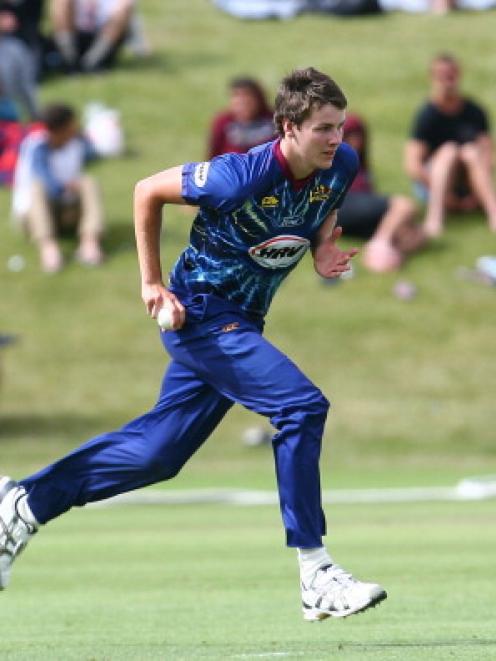 Otago seamer Jacob Duffy runs in to bowl during the Twenty20 match between Otago and Auckland in...