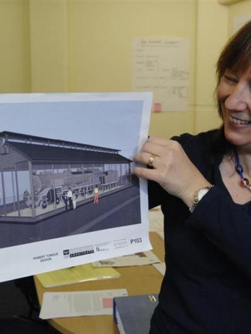 Otago Settlers Museum director Linda Wigley displays the design for a planned viewing shed for...