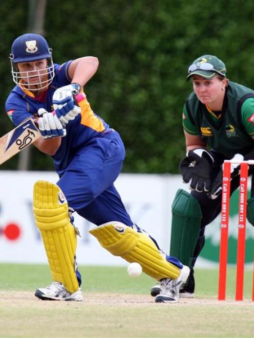 Otago Sparks batsman Suzie Bates works the ball to the on side during her innings of 42 in the...