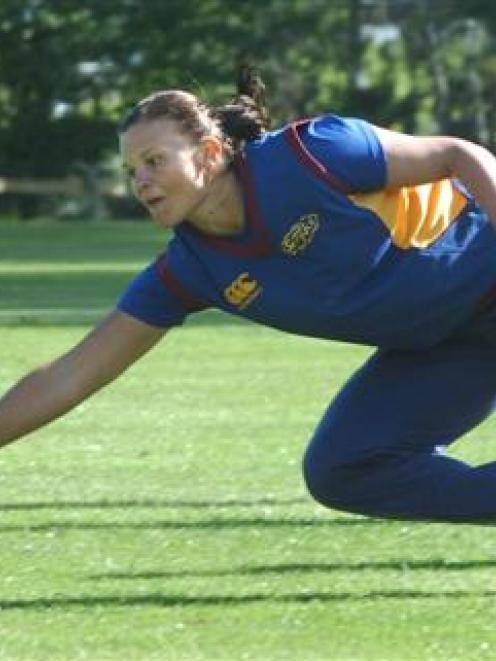 Otago Sparks co-captain Suzie Bates lunges for a catch in front of team-mate Millie Cowan during...