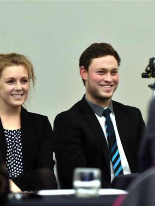Otago University law students Ellie Domigan (left) and Jamie Rohan face the judging panel in the...