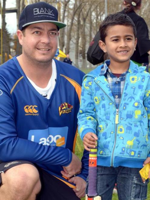 Otago Volts batsman Jesse Ryder poses for a photograph with Aron Sam Blesson (5), of Tainui...