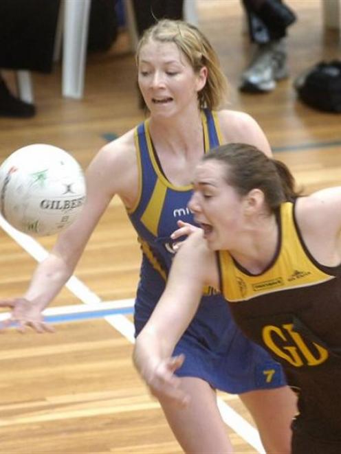 tago wing attack Millie Lees (at rear) beats Stephanie Simmons (Cook Strait) to the ball during...