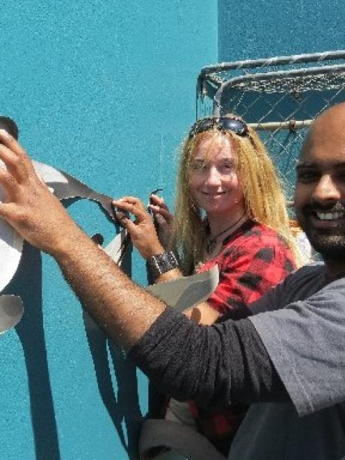 Our Seas Our Future co-ordinator Suzanne Burns and founder Noel Jhinku with a cut-out Maui's...
