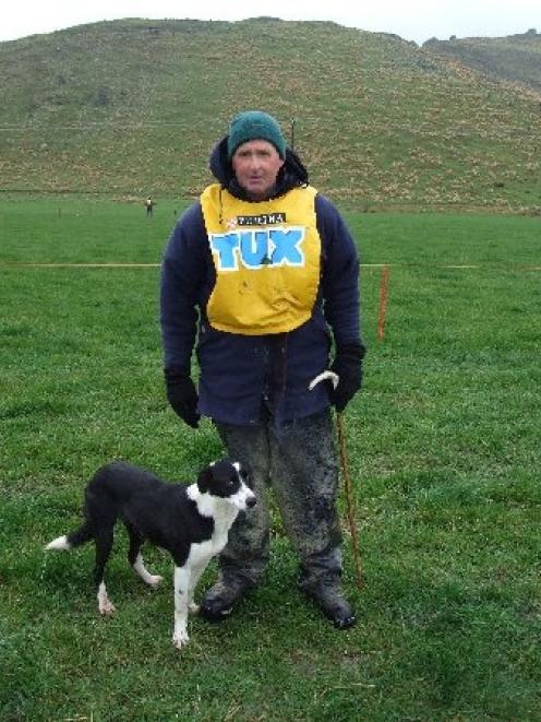 Owaka farmer Roger Sellars and 5-year-old heading dog Dice at the short head and yard course on...