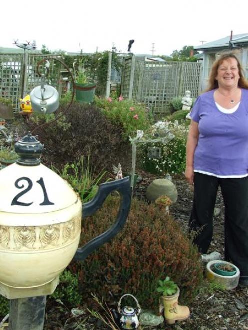 Owaka woman Judith Renwick is crazy about her teapot garden. Photo by Rachael Taylor.