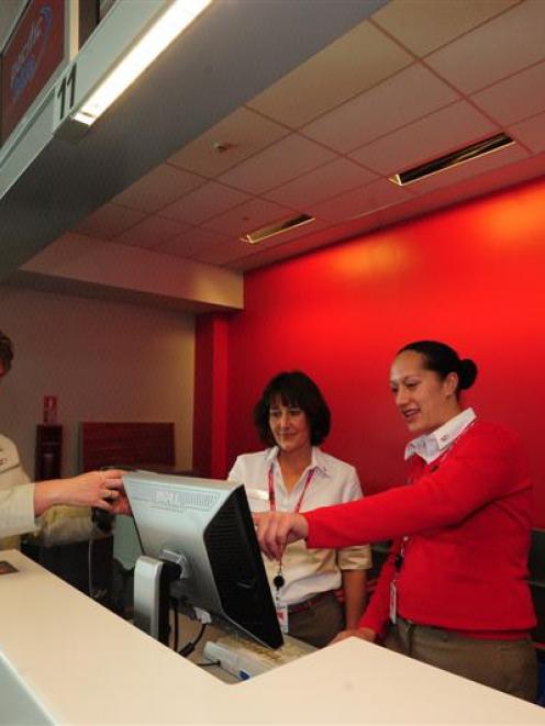 Pacific Blue guest service agents (from left) Sue Fox, Jan Hannah and Charmaine Carroll. Photo by...