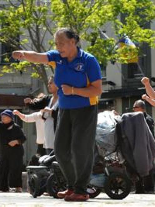 Pacific Trust Otago and members of the public take part in a Zumba class in the Octagon yesterday...