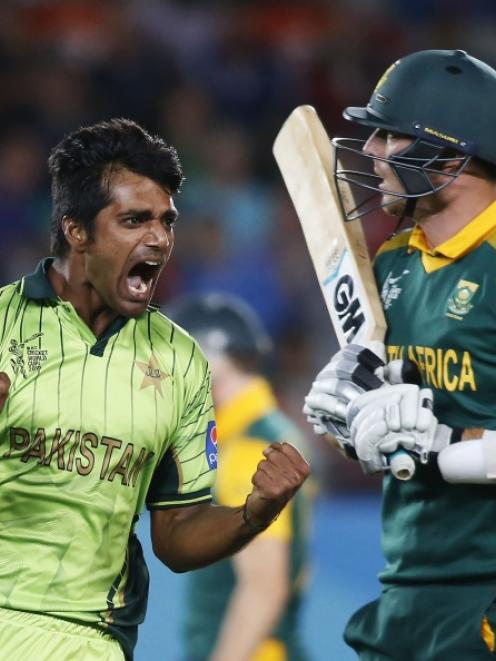 Pakistan's Rahat Ali celebrates dismissing South Africa's Kyle Abbott (R) during their Cricket...