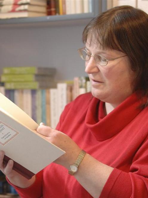 Pamela Gordon with a copy of the book. Photo by Craig Baxter.