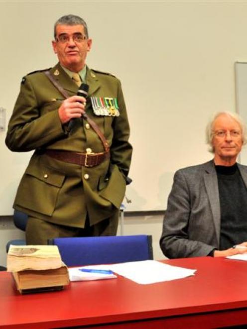 Panel members (from left) Dr George Davis, Associate Prof David McBride, Prof Kevin Clements ...