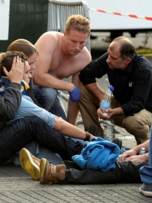 Paramedics attend to the wounded at the monster truck festival in Haaksbergen. REUTERS/Eric...