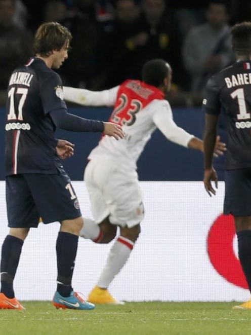 Paris St Germain's Maxwell (left) and Jean-Christophe Bahebeck (right) watch as AS Monaco's...