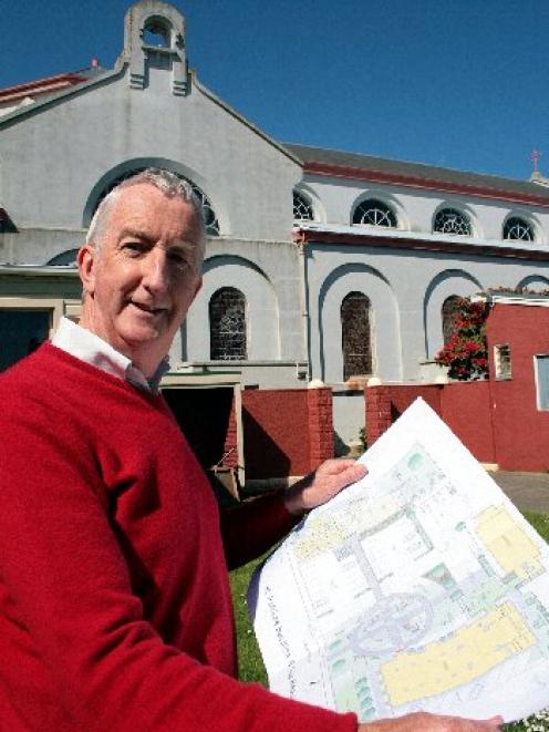 Park project ...  St Patrick's redevelopment committee chairman Sean Toomey holds plans for a ...