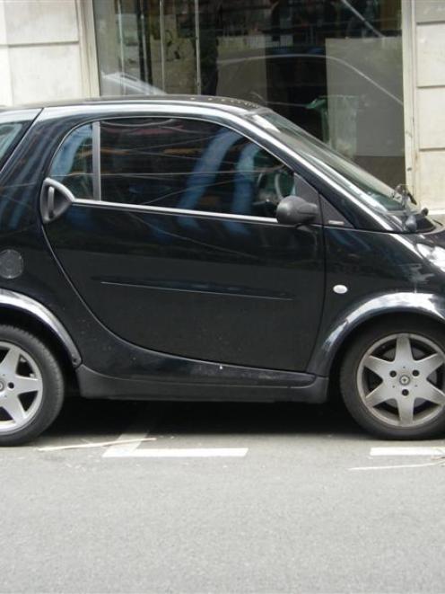 Parking in Paris is all about squeezing as many vehicles as possible in as tight a space as...