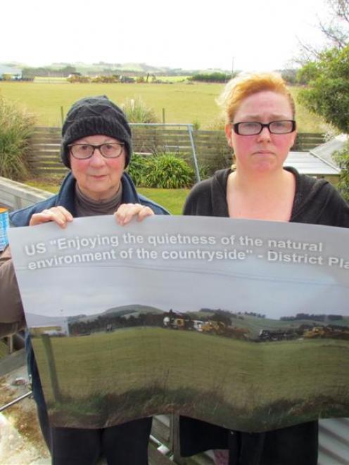 Parsons Rd residents Gen Heselwood (left) and Hayley Kennedy miss their rural view and quietness...