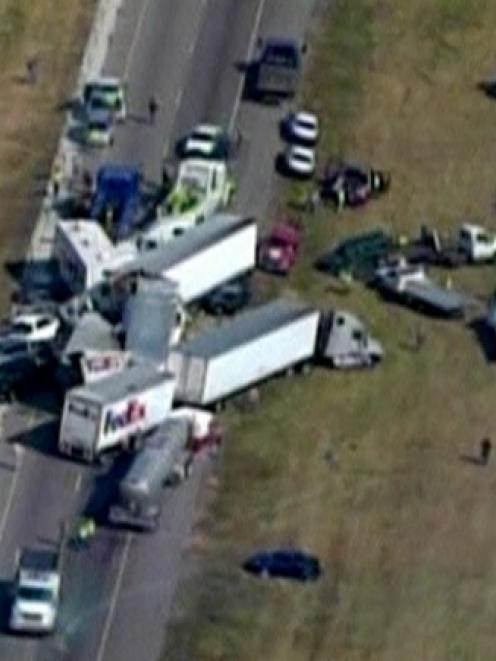 Part of the deadly 120-vehicle pileup is pictured in this still image taken from video courtesy...