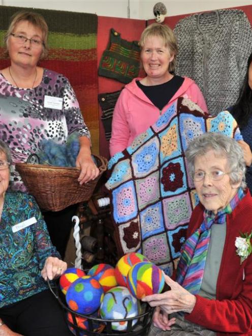 Past and present members of the Taieri Creative Fibre/Spinners and Weavers Group attend the group...