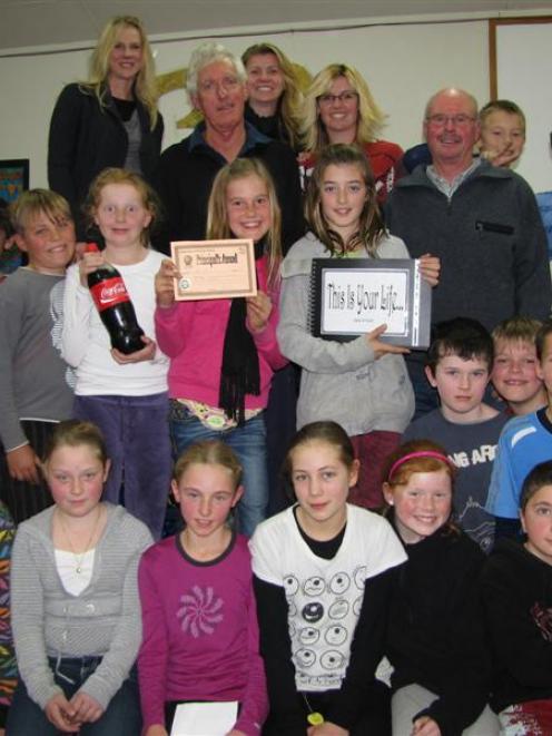 Past and present Queenstown Primary School pupils assembled on Friday to celebrate Mark Douglas'...