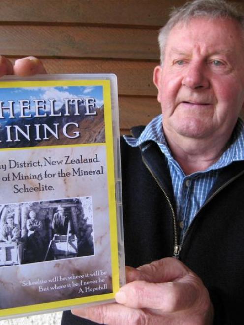 Pat Paulin holds a copy of the DVD to be launched on Saturday in Glenorchy on the story of...