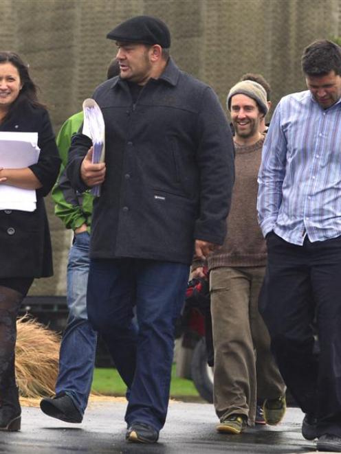 Paua to the People members (from left) Justine Camp, Kees Meeuws and Lloyd McGinty walk towards...