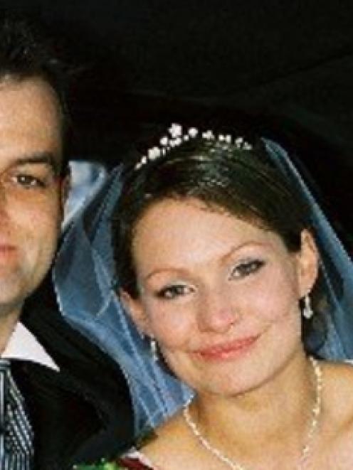 Paul and Danica Weeks on their wedding day in November 2007. The couple have two small children.