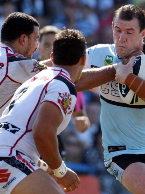 Paul Gallen of the Sharks hits it up against the Warriors.  (Photo by Craig Golding/Getty Images)