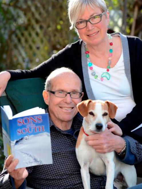 Paul Highton, of Dunedin, relaxes with  wife Jan and their dog, Pebbles, one of the characters in...