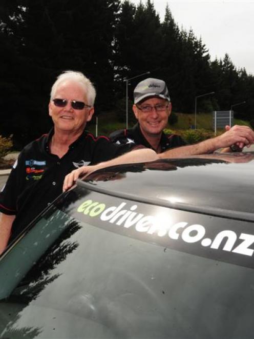 Paul Owen (left) and Mark Whittaker with the Mini Cooper D they are driving from Cape Reinga to...