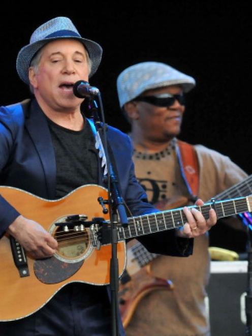 Paul Simon performs the album 'Graceland' live on stage during the third day of Hard Rock Calling...