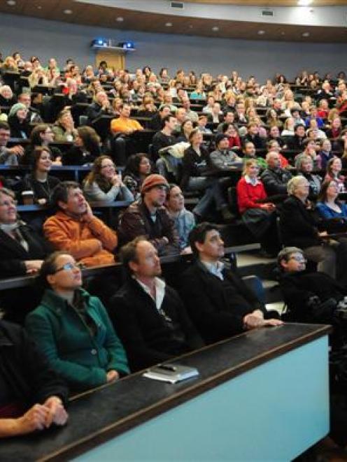 People listen to Dame Jane Goodall's lecture streamed live to the Castle Street 2 lecture theatre...