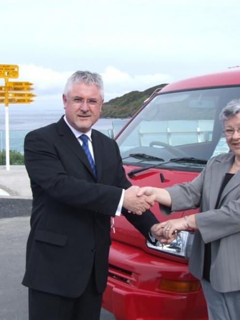 Perpetual Trust regional manager David Boyce, of Dunedin, hands over the van keys to Bluff...