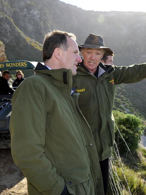 Perry Reid with John Key at Natures Wonders in 2010. Photo: Gerard O'Brien