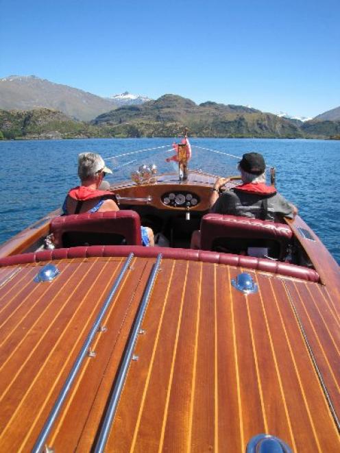 Peter and Marilyn Duncan with their boat Swan Song at Glendhu Bay, Lake Wanaka. Photo by Mark Price.