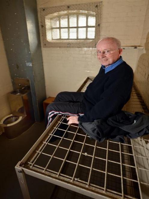 Peter Caswell tests a top bunk for comfort. Photos by ODT.