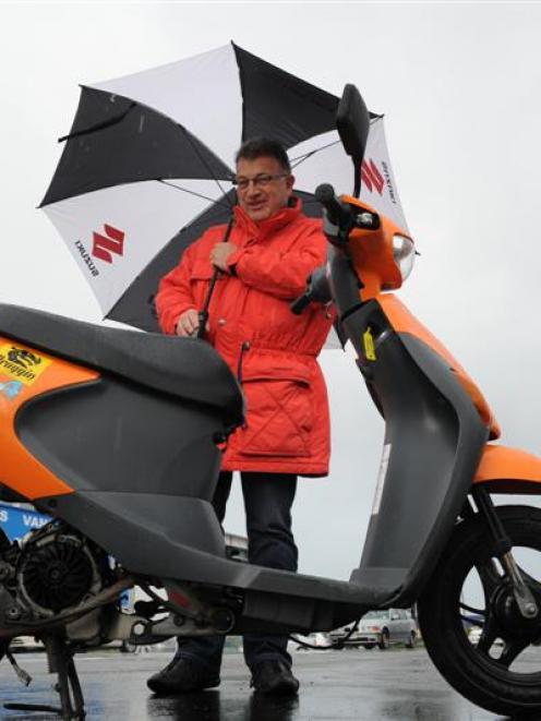 Peter Donaldson ponders the prospect of crossing the Southern Alps on a 50cc Suzuki scooter. ...